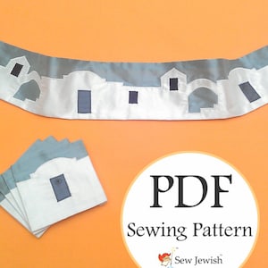 May include: A PDF sewing pattern for a white and gray fabric cityscape with the text "PDF Sewing Pattern" and the logo "Sew Jewish".