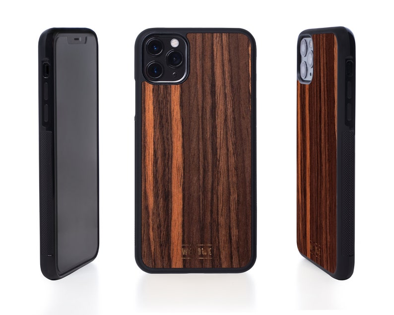 May include: A black phone case with a wood grain pattern. The case has a raised camera bump and a black trim around the edges.