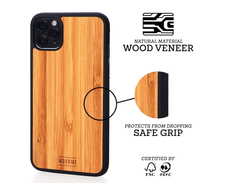 May include: A brown wood phone case with a black border and a black rubberized edge for a secure grip. The case is made from natural wood veneer and is certified by FSC and PEFC. The case is designed to protect your phone from drops.