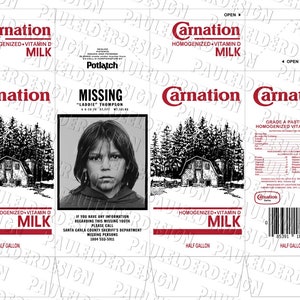 May include: A vintage Carnation milk carton with a missing child poster on the side. The poster features a black and white photo of a young boy with the text "MISSING" and "LADDIE THOMPSON". The carton is white with red text and a red logo. The carton is half a gallon and contains homogenized vitamin D milk.