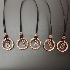 Gympie Dream Time Infinity 5G Tensor Ring Pendant