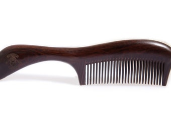 The FaceKevlar Black Sandalwood Long Handled Comb