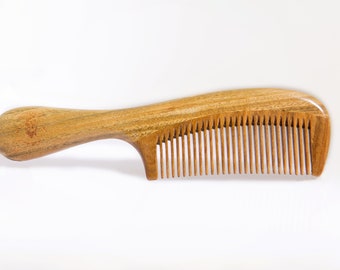 The FaceKevlar Green Sandalwood Long Handled Comb