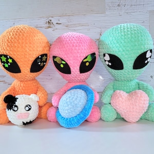 Out-of-this-world Cosmo the Alien crochet pattern with thorough guidance and vivid illustrations, perfect for handcrafting a lovable extraterrestrial pal, unforgettable gift, or quirky room decor!