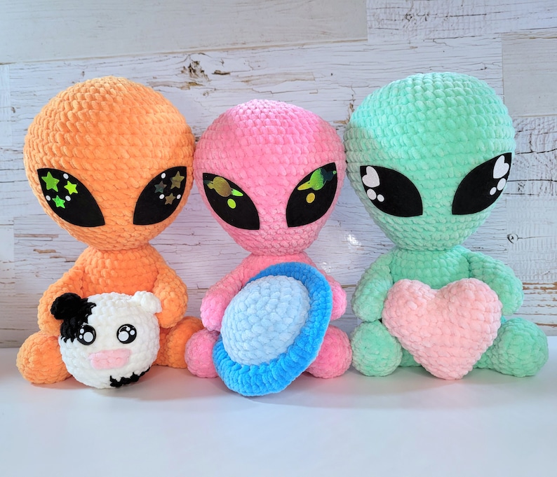 Out-of-this-world Cosmo the Alien crochet pattern with thorough guidance and vivid illustrations, perfect for handcrafting a lovable extraterrestrial pal, unforgettable gift, or quirky room decor!