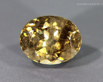 Cassiterite, yellow-brown faceted, Bolivia. 3.39 carats. (Video)