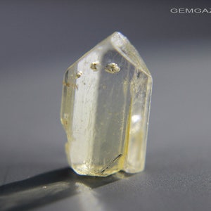 Topaz crystal with Fuchsite Mica inclusions, Brazil. 9.52 carats.