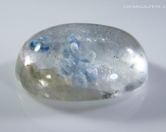 Quartz cabochon with Gilalite inclusions, Brazil. 7.23 carats.