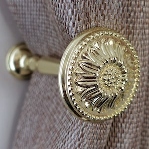 Embrasses de rideaux ‘Camomille’ - Bronze brillant 120mm (Pack de 1)