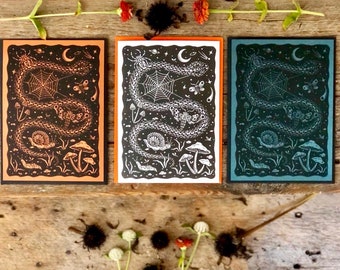 Slither Linocut. Halloween Card. Hand Printed Note Card. Handmade Card. Greeting Card. Halloween. Snake. Moths. Mushroom. Moon.