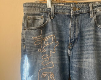 Sz 14/16: Upcycled Embroidered Matisse Picasso Face Jeans