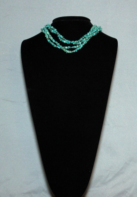 8 inch necklace of 4 strands of turquoise nuggets… - image 1