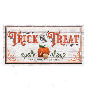 May include: A white wooden sign with black lettering that reads "Trick or Treat" with a pumpkin and smaller pumpkins below the text. The sign also says "Tradition Since 1881".