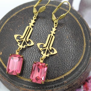 Pendientes colgantes geométricos Art Déco en oro rosa oscuro, estilo flapper de Charleston.