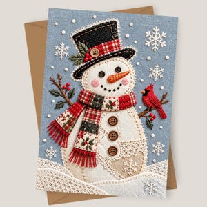 May include: A greeting card featuring a snowman with a black top hat, a red and green plaid scarf, and three brown buttons. The snowman is surrounded by white embroidered snowflakes, a red cardinal on a branch, and a white lace border.
