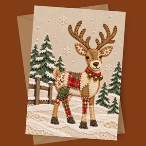 May include: A greeting card featuring a reindeer made of patchwork fabric with a red collar and gold bells. The reindeer stands in a snowy landscape with green pine trees, a wooden fence, and white embroidered snowflakes on a beige background.