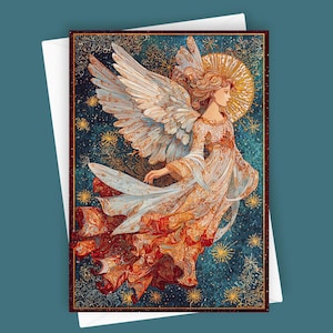 May include: Greeting card featuring an illustration of an angel with large white and light blue wings, wearing a flowing gown in shades of orange, gold, and white. The background is a dark blue with gold stars and a golden halo. The card is inside a white envelope.