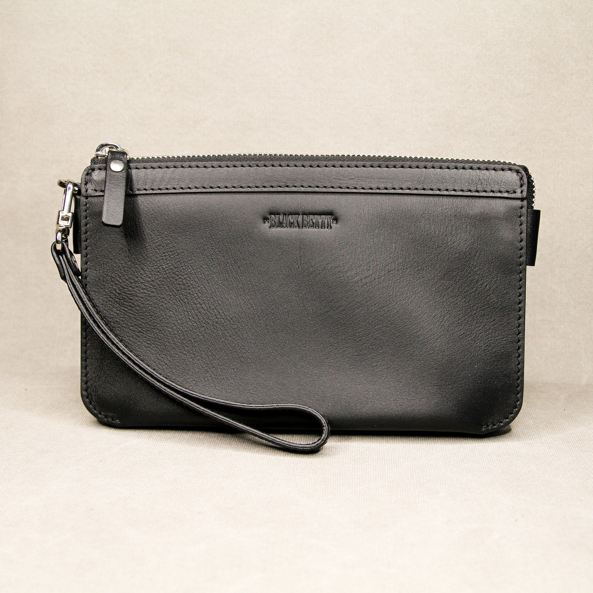 Leather clutch with wrist strap Etsy