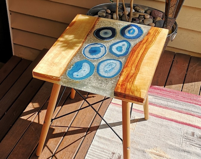 Timber and resin river coffee table with inlaid blue agate slices