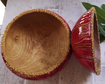 Hand-turned Wooden bowls painted with burgundy and gold resin and finished with gold beading