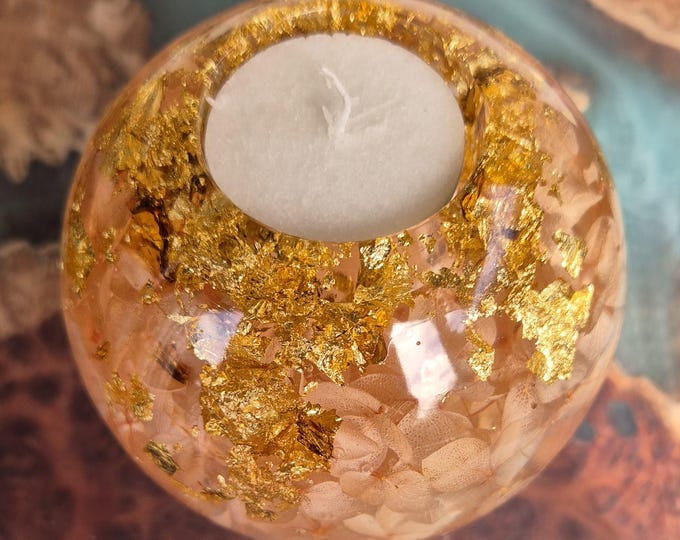 Large round resin candle holder with embedded pink dried hydrangea flower petals and gold foil