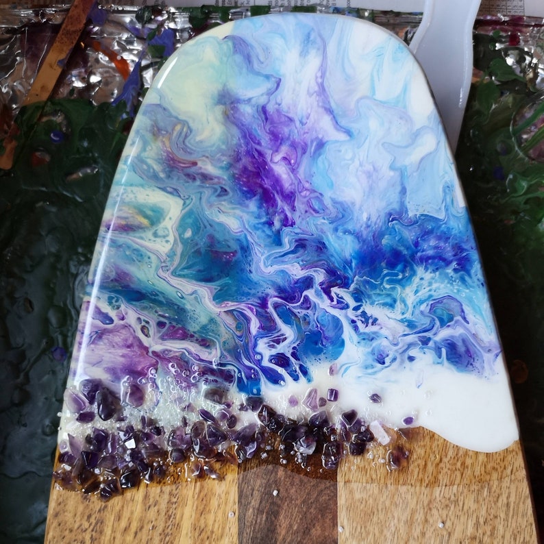 Wood cheese board with artwork and amethyst stones