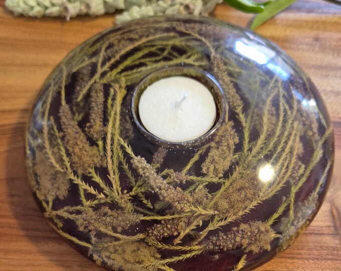 Large round tea light candle holder with dried Australian native flowers in burgundy resin