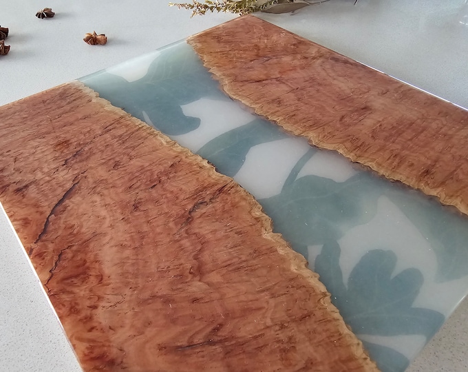 Australian Burl timber serving board with inlaid monstera leaf artwork in clear resin