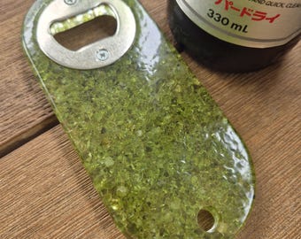 Luxury resin bottle opener with inlaid green peridot gemstones