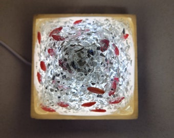 Ixora dried flower petals and clear glass chips in resin LED bedside lamp