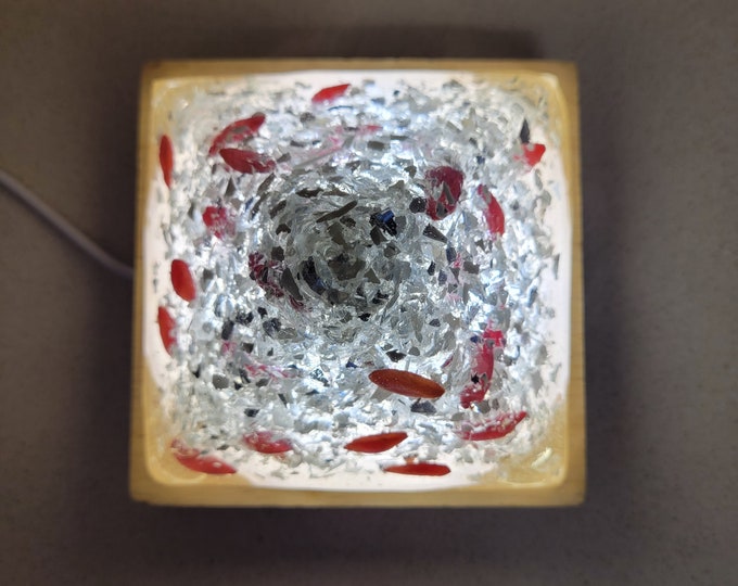 Ixora dried flower petals and clear glass chips in resin LED bedside lamp