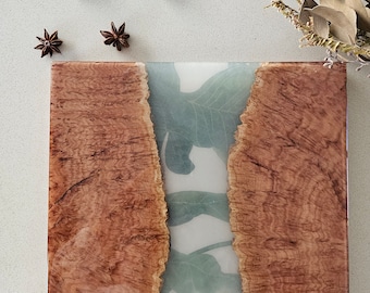 Burl timber serving board with monstera artwork embedded in resin