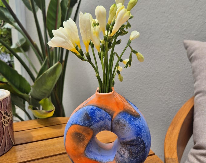 Blue and orange concrete donut vase