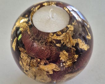 Large round resin candle holder with embedded dried red Western Australian flowering gum and gold foil