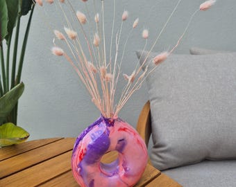 Red and purple concrete hollow donut vase