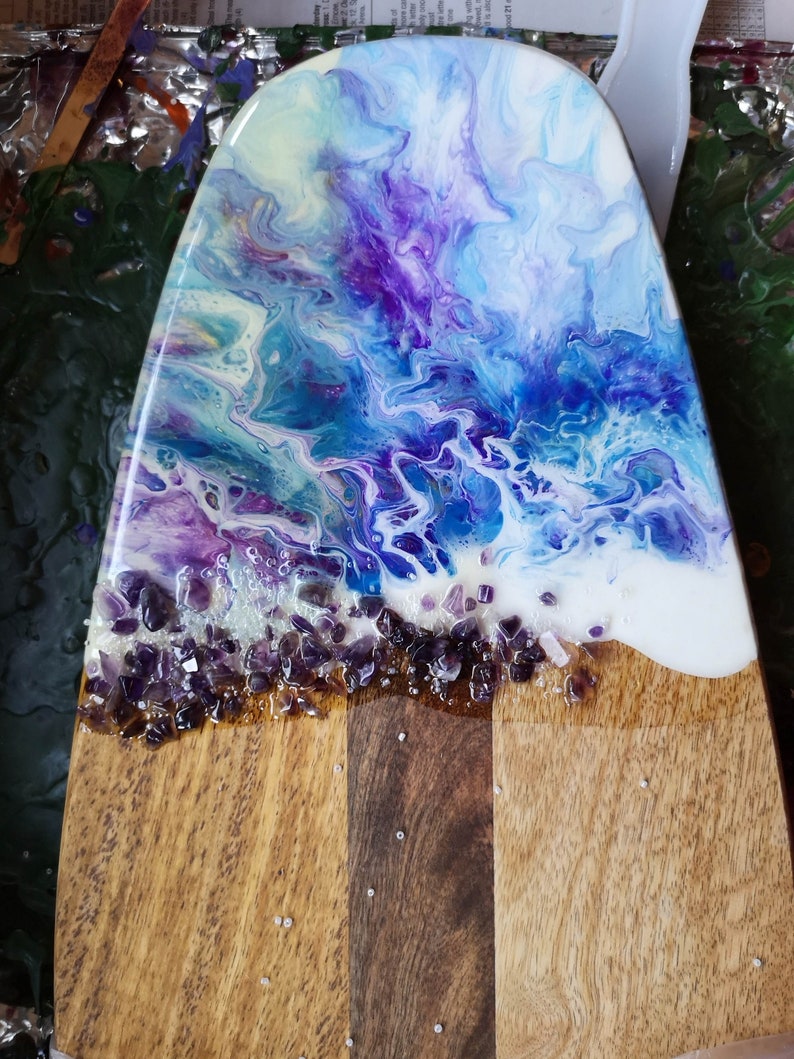 Wood cheese board with artwork and amethyst stones