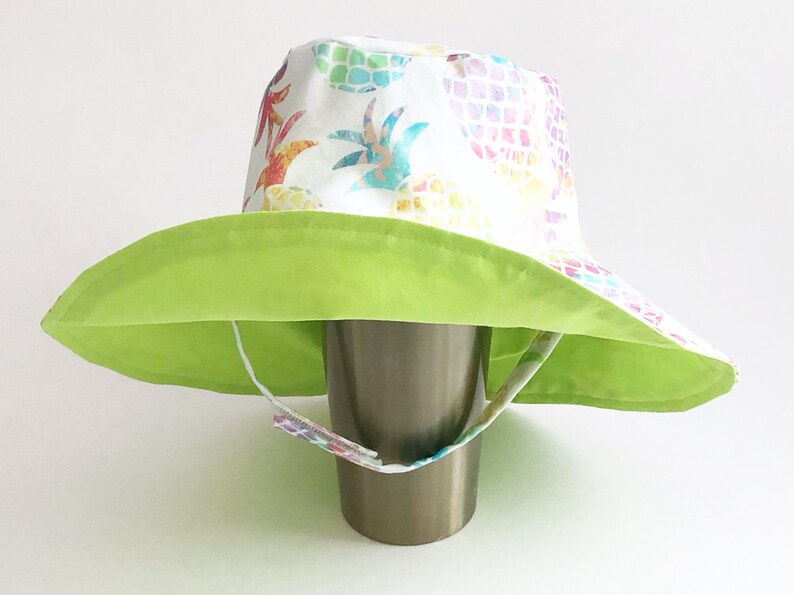 Girl Rainbow Pineapple Toddler Medium Wide Brim Bucket Hat, Chinstrap, for the Beach, Sun and Outdoors image 1