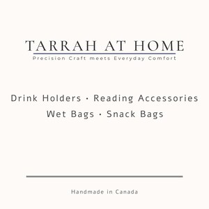 May include: Cream-colored graphic with the text "TARRAH AT HOME" and the tagline "Precision Craft meets Everyday Comfort." Below, it lists "Drink Holders, Reading Accessories, Wet Bags, Snack Bags." The text "Handmade in Canada" is at the bottom.