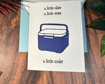 Navy blue cooler and wiser card, hbd from a far note, celebration card