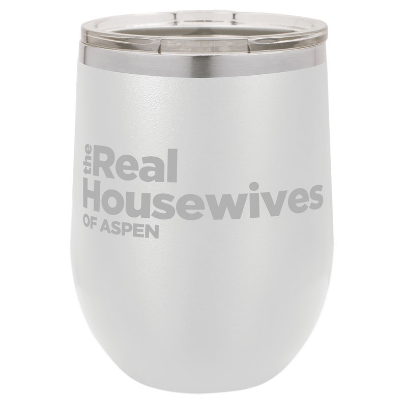 May include: White stainless steel wine tumbler with the text "the Real Housewives of Aspen" printed on the side.