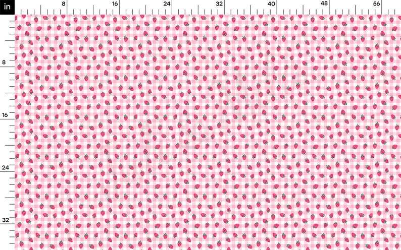 May include: Pink and white gingham fabric with a repeating pattern of small red strawberries.