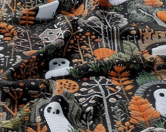 May include: Black fabric with a repeating pattern of white ghosts, orange and green foliage, and small houses. The fabric has a textured, quilted look.