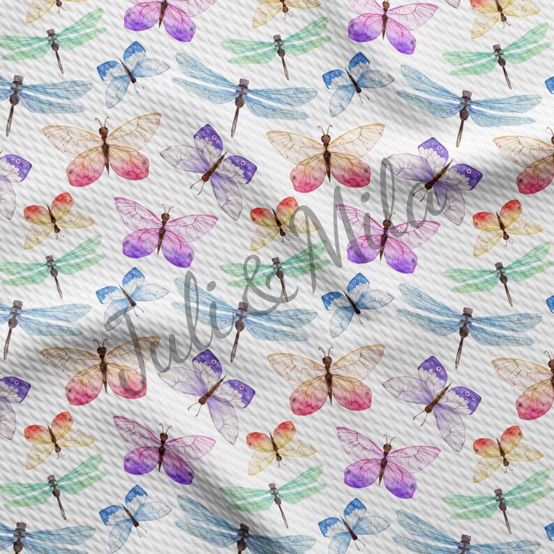 May include: A seamless pattern featuring watercolor illustrations of butterflies and dragonflies in various colors, including pink, purple, blue, green, and yellow. The butterflies and dragonflies are arranged in a random pattern on a white background.