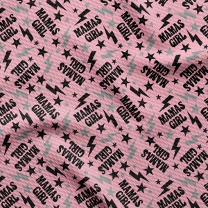 a pink background with black and white stars