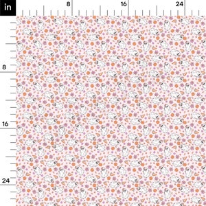 May include: A light pink Halloween fabric featuring a repeating pattern of white ghosts, orange pumpkins, purple stars, and pie slices. Ideal for craft projects and seasonal decorations. The pattern repeats across the fabric.
