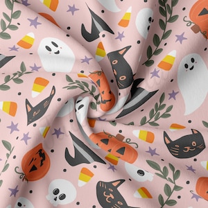 May include: A pink fabric with a repeating pattern of Halloween-themed illustrations. The pattern includes ghosts, pumpkins, black cats, candy corn, stars, and witches' hats.
