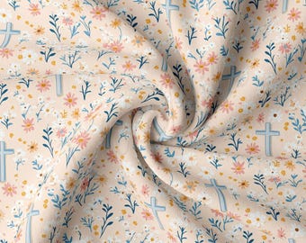 May include: A peach-colored fabric with a repeating pattern of white and pink flowers, blue leaves, and white crosses.