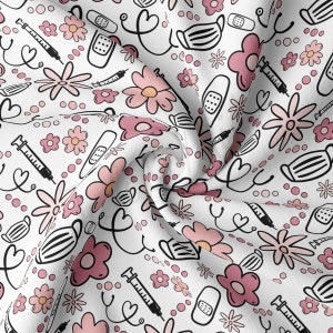 May include: White fabric featuring a repeating pattern of pink flowers, medical masks, syringes, bandages, and stethoscopes in black outline. The design has a whimsical, medical theme.