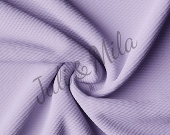 Tela Liverpool Bullet texturizada color lila pastel cortada a medida, elástica en 4 direcciones, de punto grueso de media yarda, ideal para lazos.