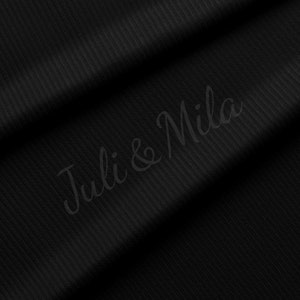 May include: Black ribbed fabric with the text "Juli & Mila" in white cursive writing.